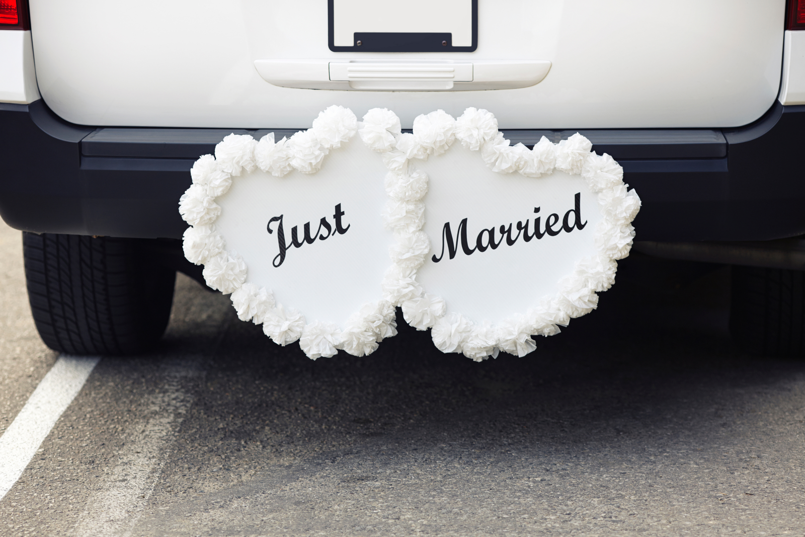 Wedding transportation with Just Married signs